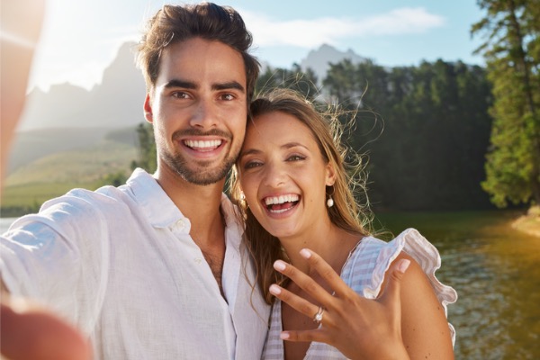 happy couple getting engaged